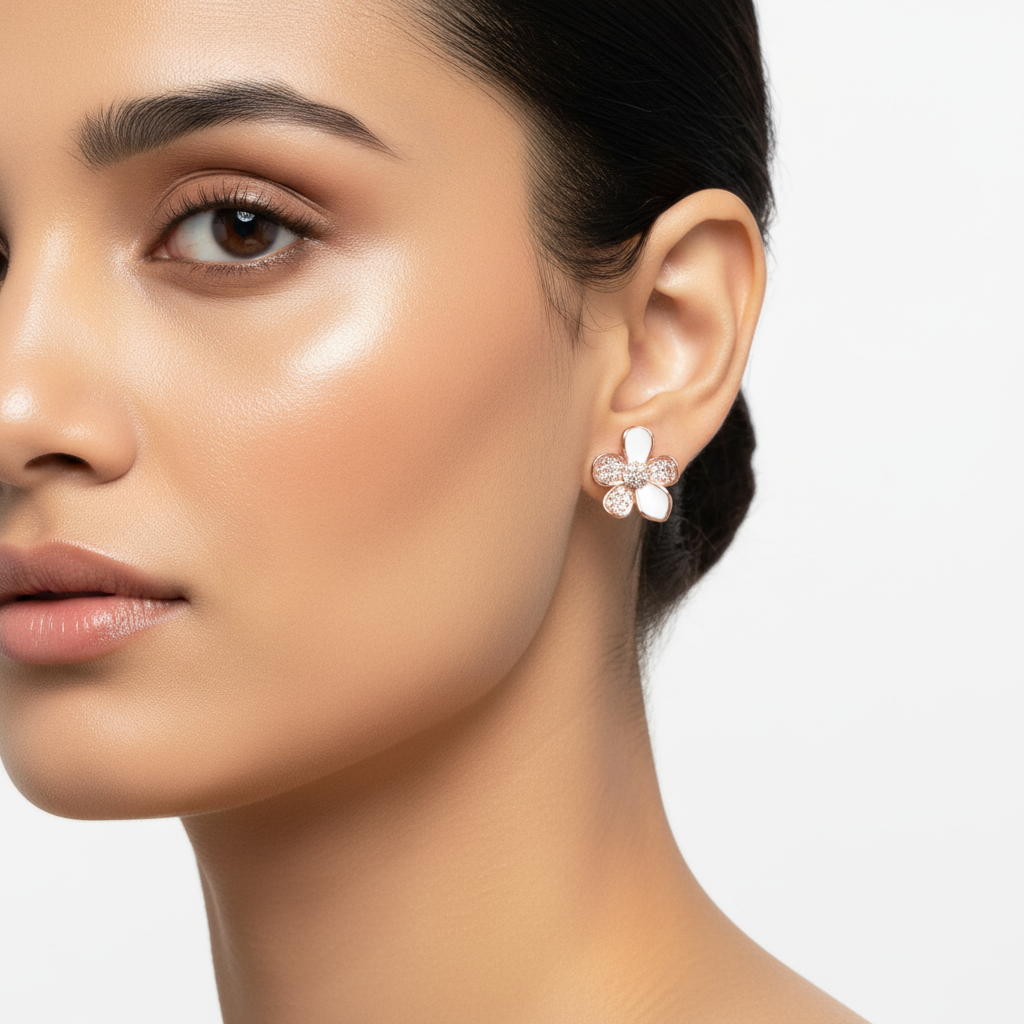 Model wearing rose gold flower earrings - close-up